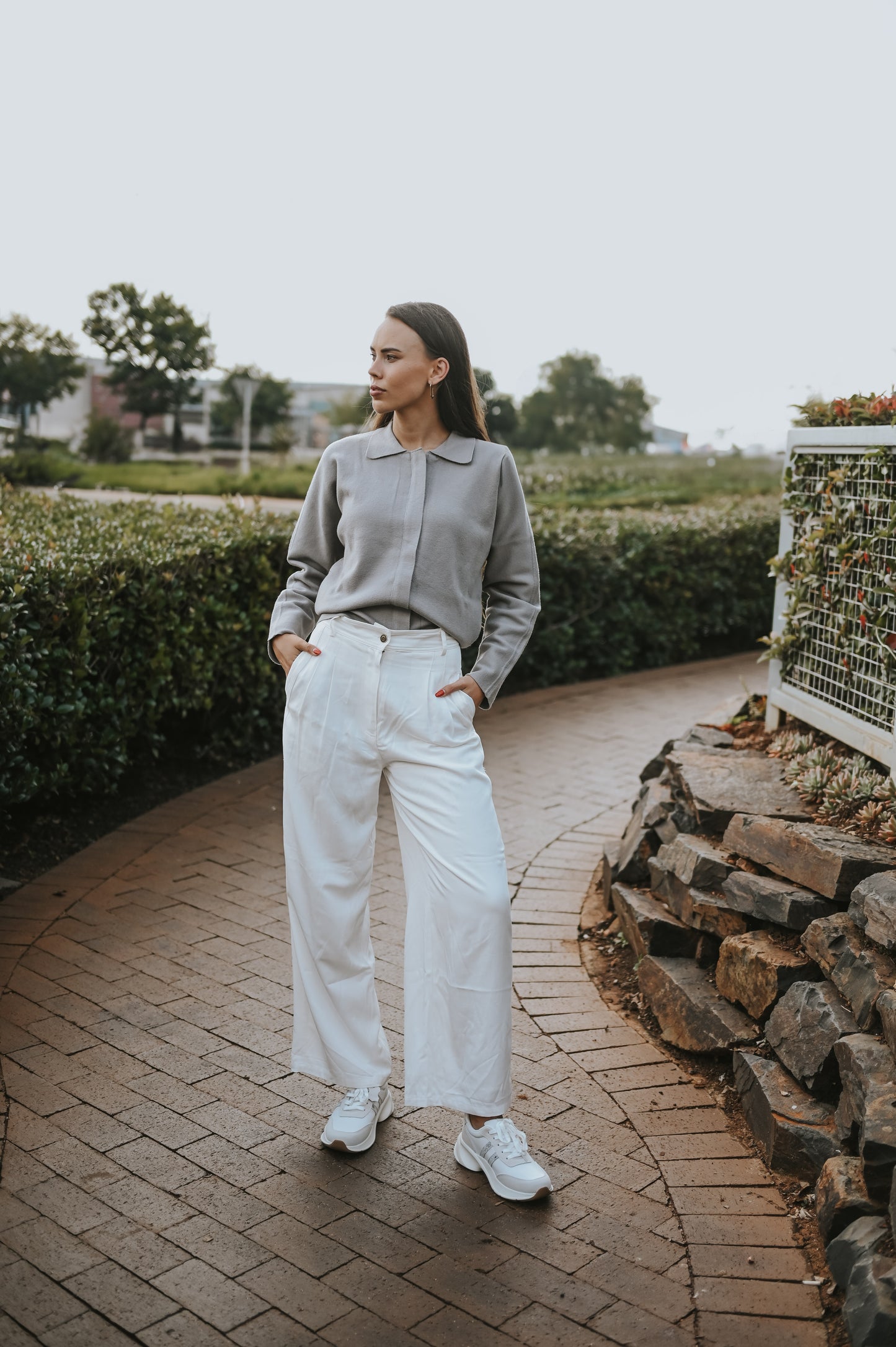 Light grey cardigan with long sleeves and hidden zipper