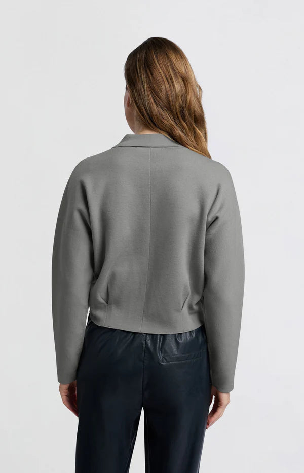 Light grey cardigan with long sleeves and hidden zipper